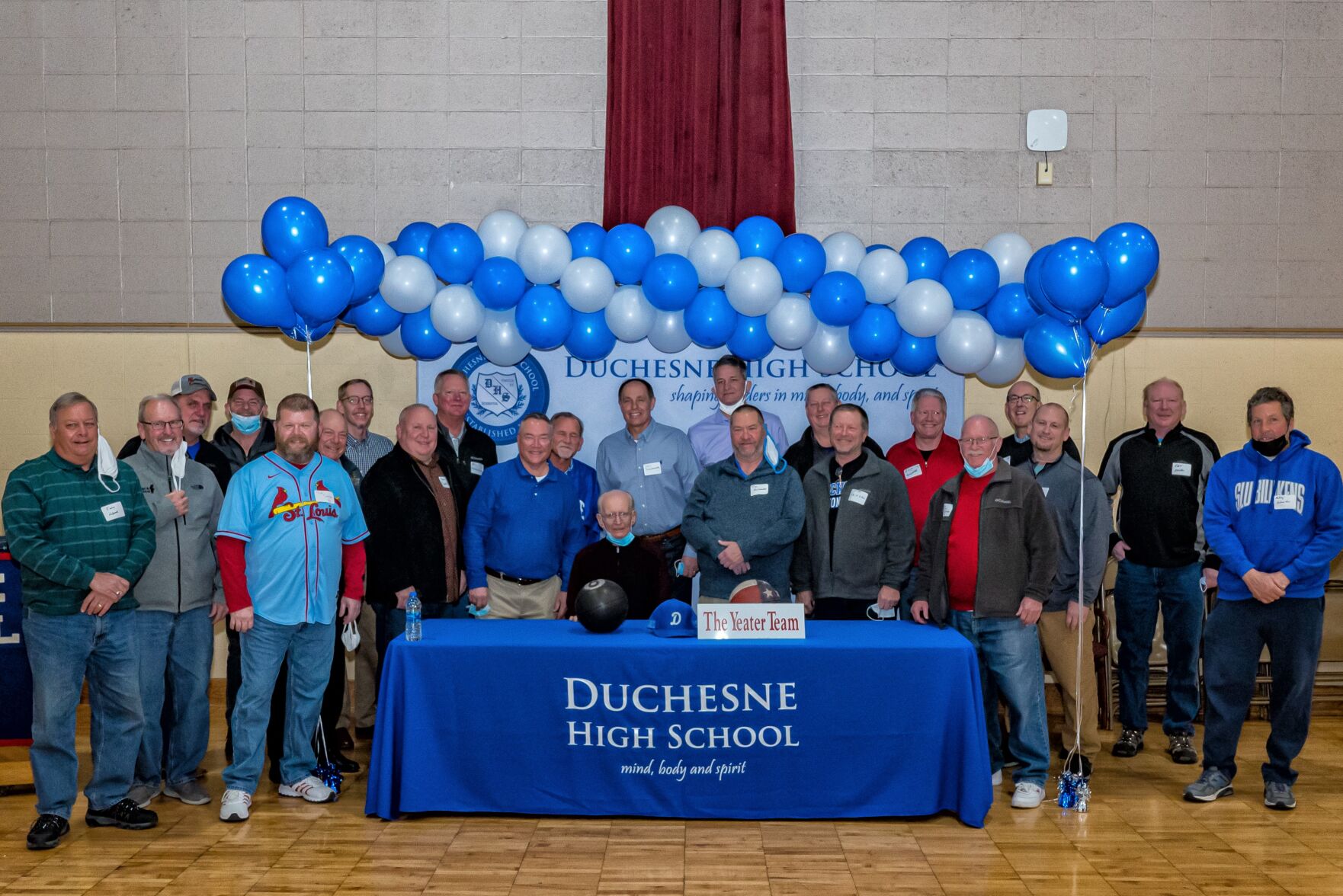 Ted with past coaches and players